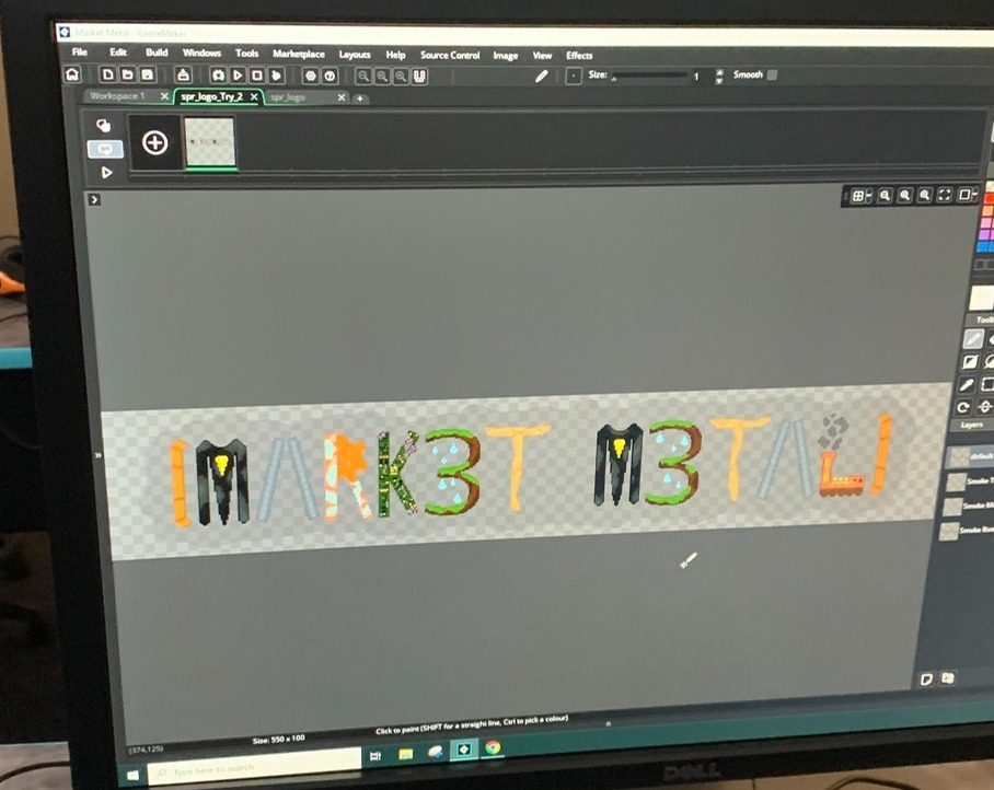 AJ working on the games Logo